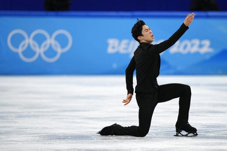Chen delivers record short program to begin Olympic pursuit
